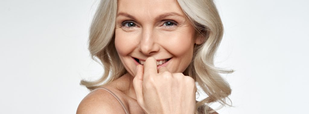 Smiling older woman after BOTOX® Cosmetic treatments