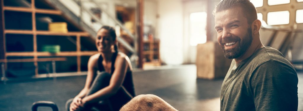 Couple working out after EmSculpt treatments