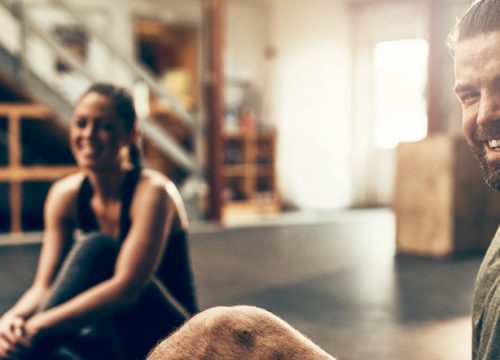 Couple working out after EmSculpt treatments