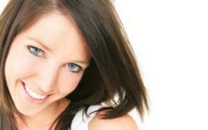 Smiling woman with blue eyes