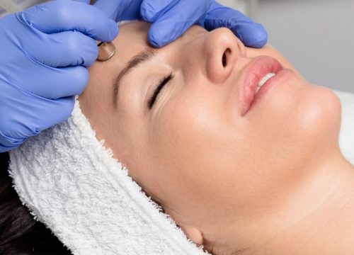 Woman getting a microdermabrasion treatment