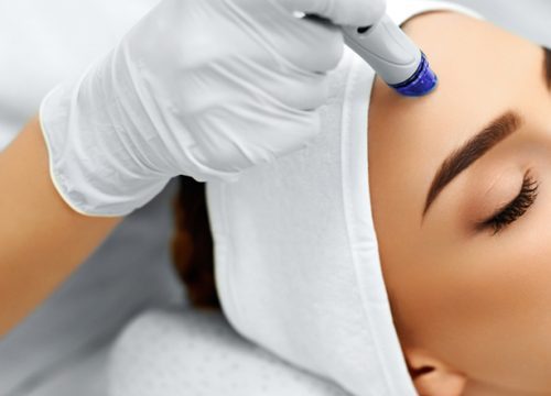 Woman getting a HydraFacial treatment