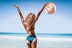 Happy woman at the beach