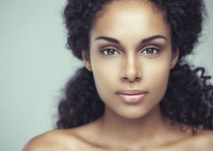 Portrait of a beautiful young woman smiling.