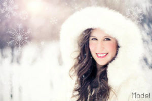 Woman wearing a white winter coat