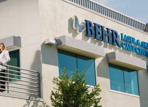 Dr. Behr standing on the balcony of Behr Laser and Skin Care Center