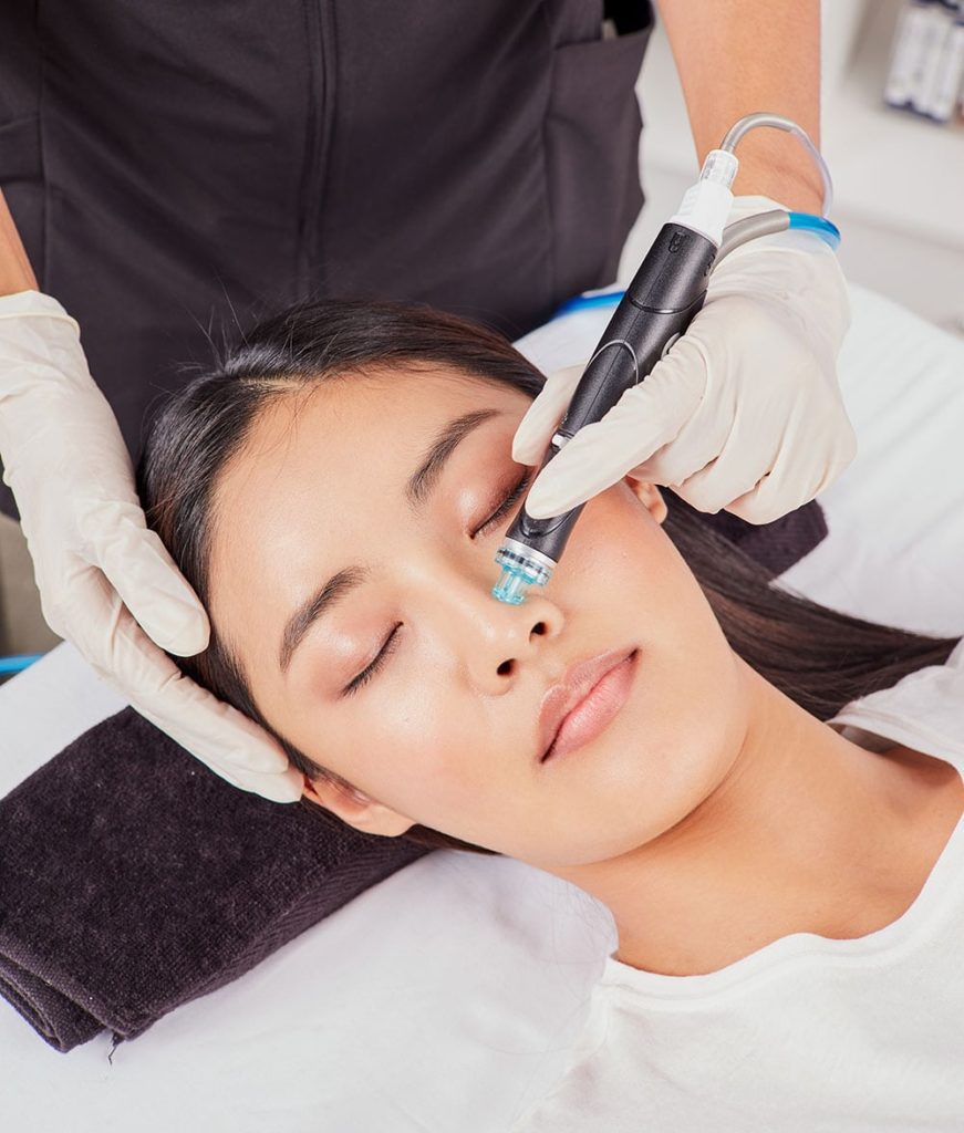 Woman receiving a HydraFacial treatment